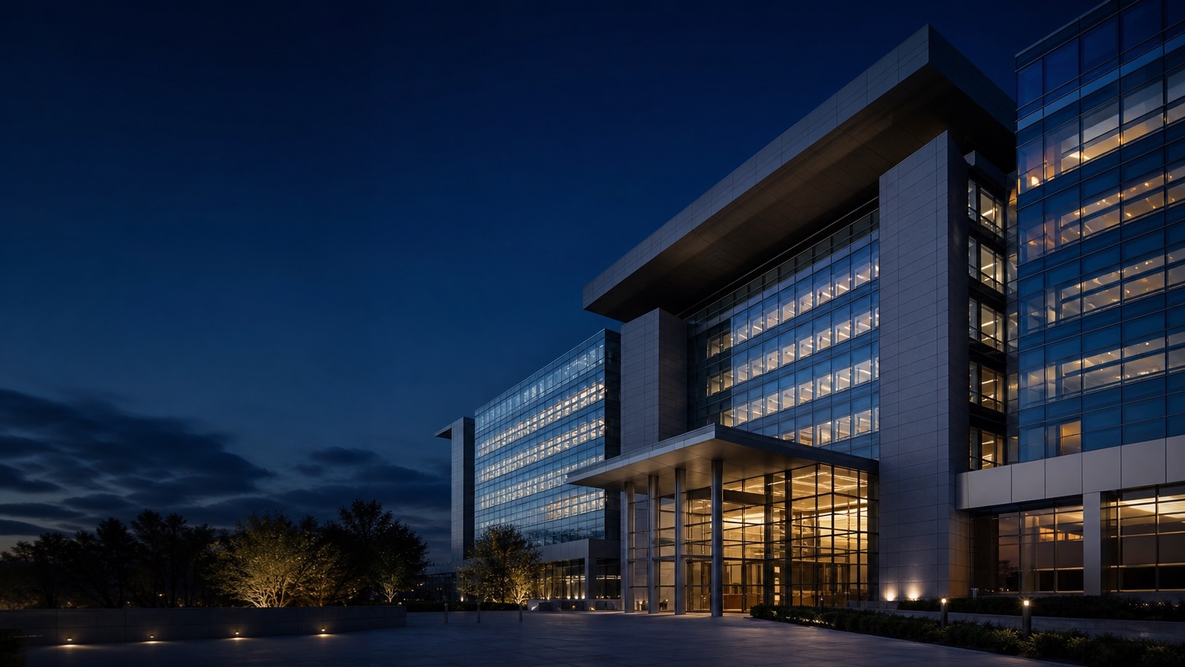 Modern corporate headquarters at blue hour